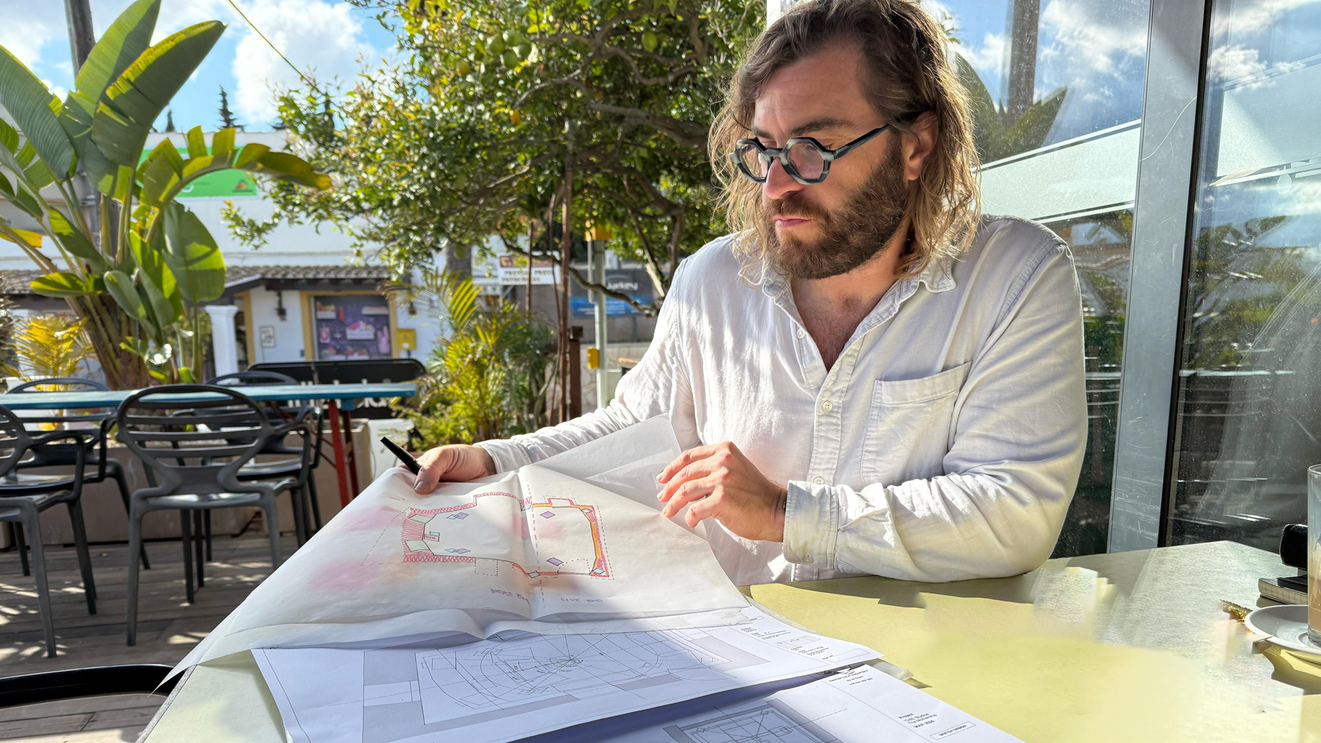 Alasdair W Grant reviewing drawings — design direction